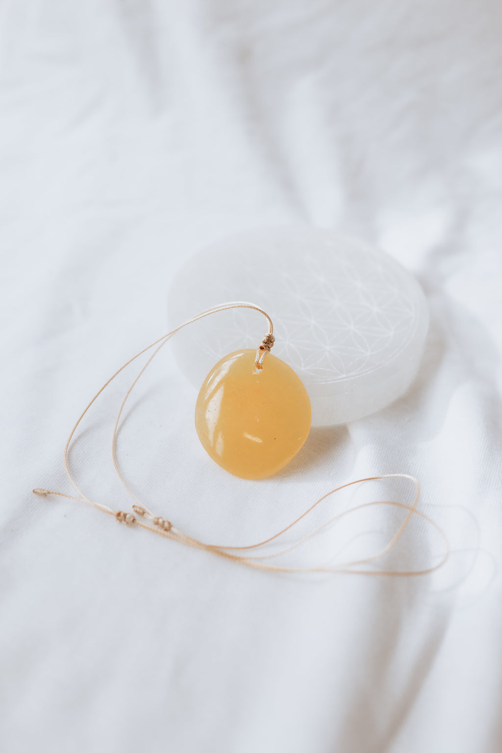 Orange Calcite Crystal Pendant on adjustable cord | Joy • Creativity • Motivation