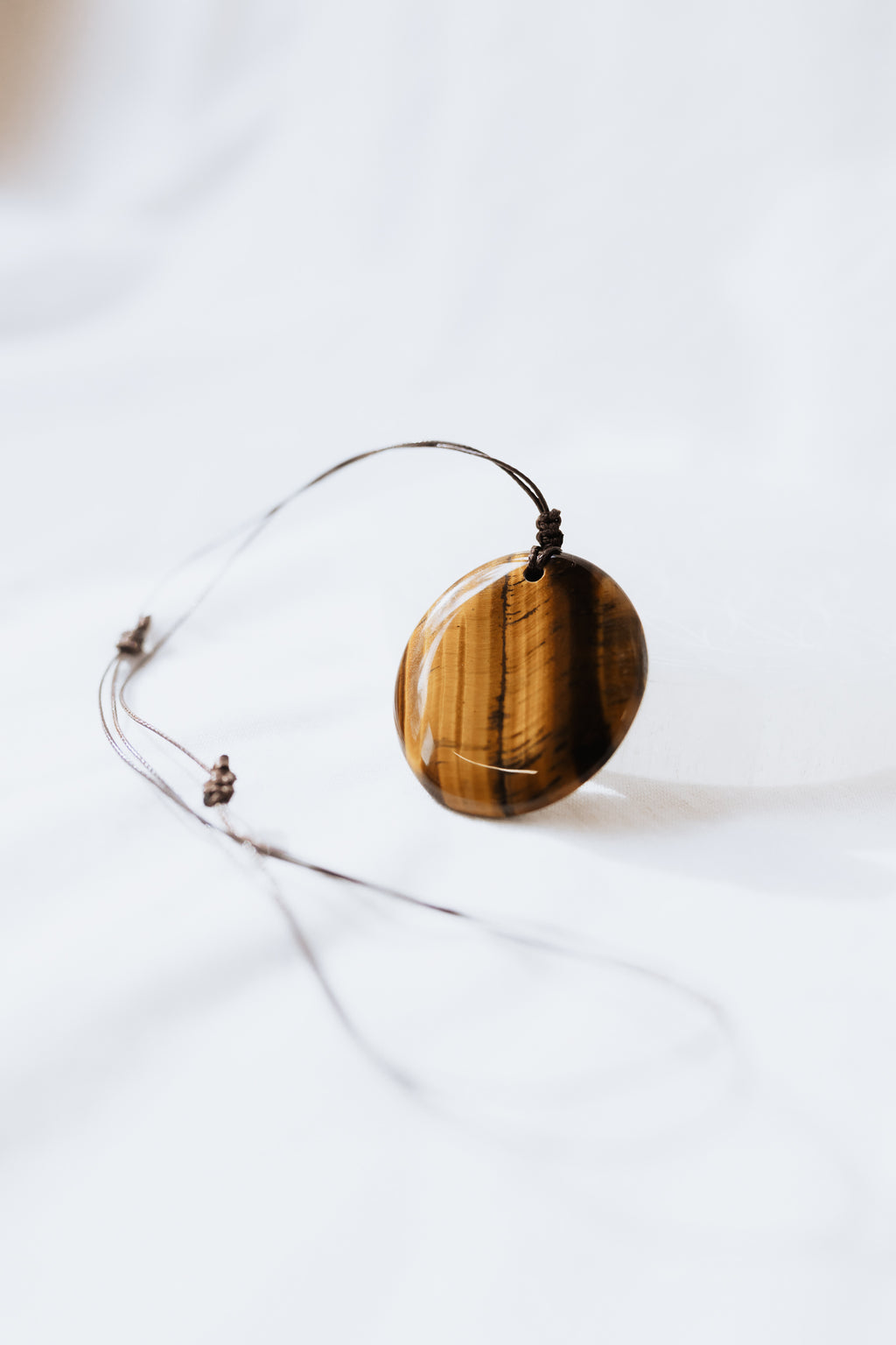 Tigers Eye Crystal Pendant on adjustable cord | Courage • Confidence • Strength